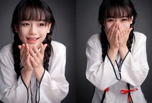南笙姑娘：南笙在豆瓣網(wǎng)上傳她自己的一系列復(fù)古照片，憑借長著一張?zhí)鹈赖耐仯駠鴮W(xué)生裝扮，梳著兩條可愛的辮子，萌到不行的清純形象，成為宅男新一代時(shí)尚女神。